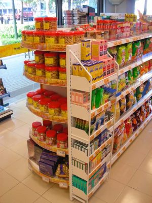 End gondola with curve shelving and side perforated display rack (Cheers store).